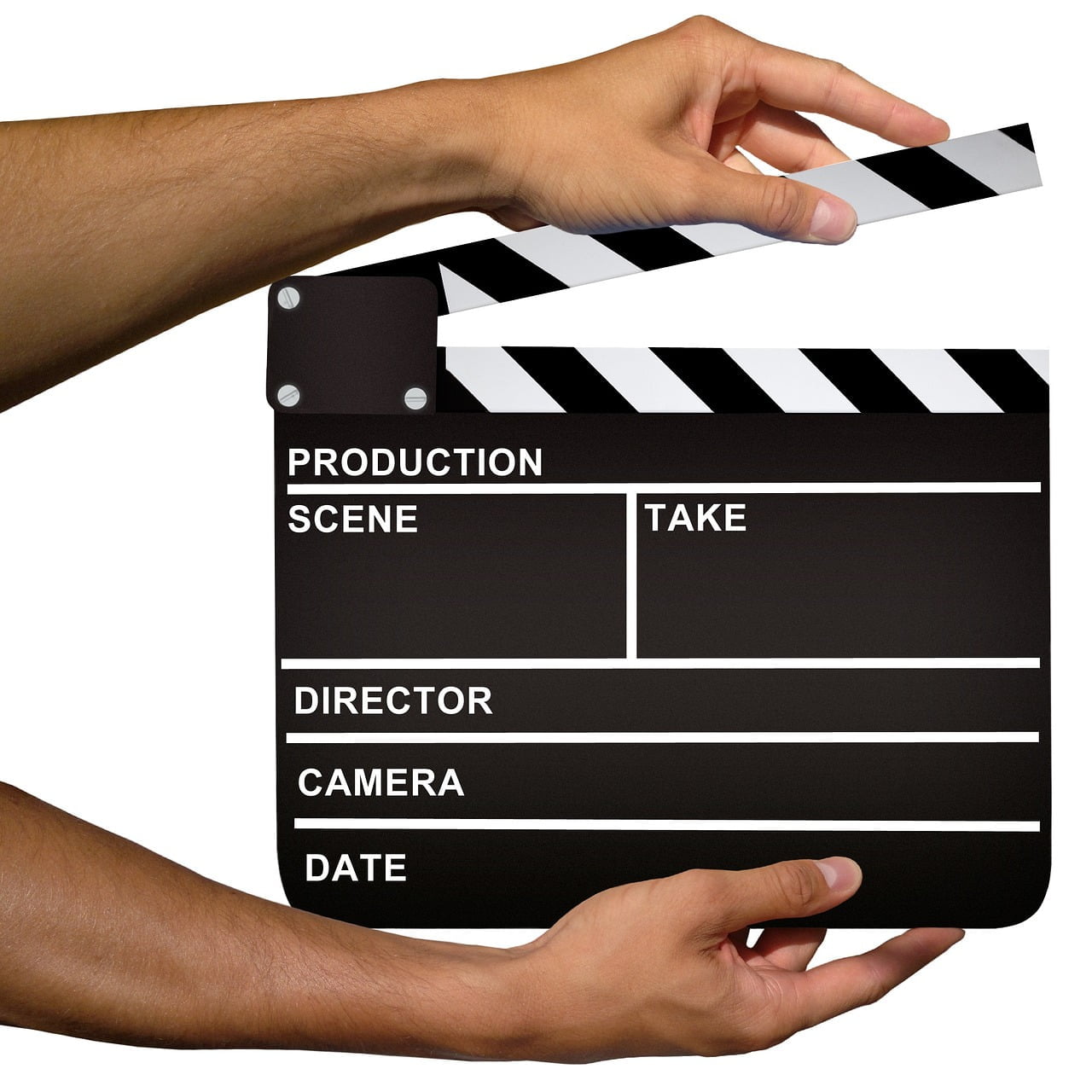 A person's hand holding an open movie clapperboard, with fields for production, scene, take, director, camera, and date.